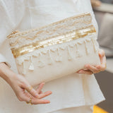 Glamour fringe clutch